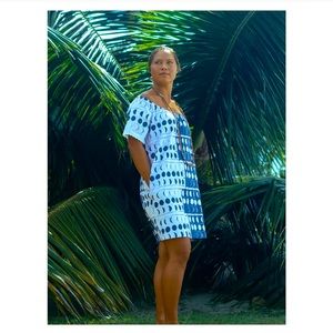 kealopiko small, brand new. Dress is lavender/pinkish& blue not black/white.